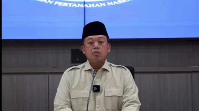 Potongan video klarifikasi: pejabat menyampaikan permintaan maaf; featured image untuk artikel “Nusron Wahid” soal pernyataan tanah milik negara.