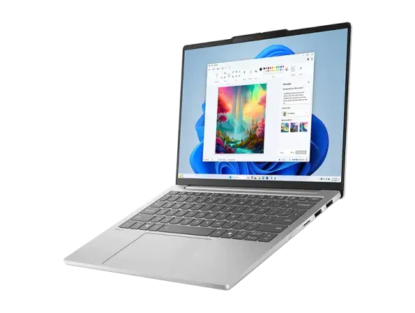 Laptop IdeaPad Slim 5 13ARP10 berwarna Cloud Grey menampilkan layar Windows 11 dengan aplikasi Paint terbuka.